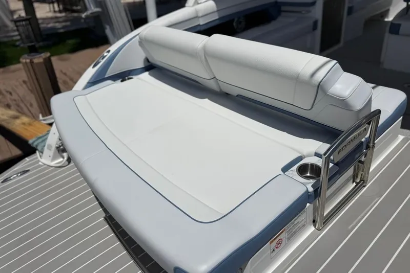 Slide: The Image of 2025 Formula 330 Crossover Bowrider OB, featuring sleek white seating and stainless steel accents. - 16