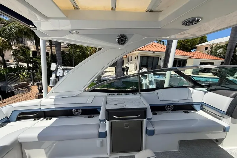 Slide: The Image of 2025 Formula 330 Crossover Bowrider OB interior with luxurious seating and modern design. - 20