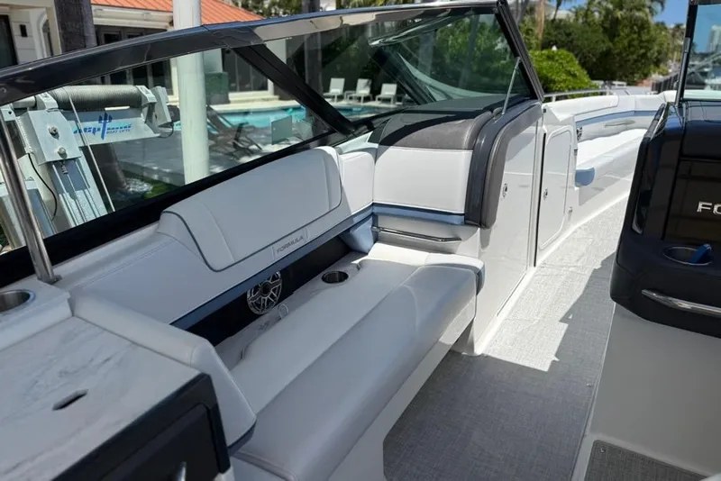 Slide: The Image of 2025 Formula 330 Crossover Bowrider OB interior with sleek seating and modern design. - 23