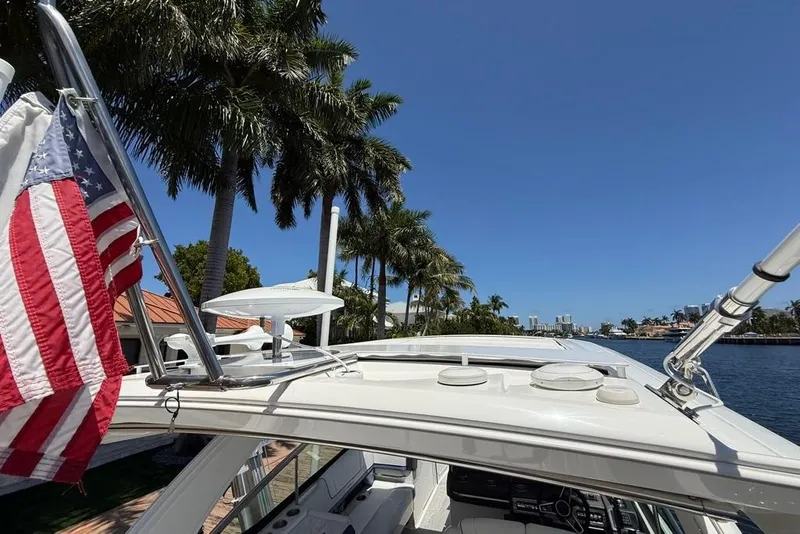Slide: The Image of Throttle control of 2025 Formula 330 Crossover Bowrider OB boat cockpit. - 39