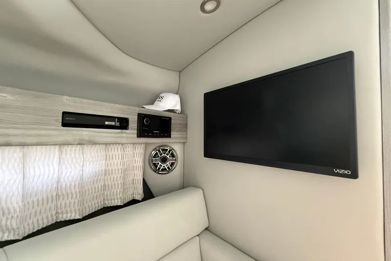 Slide: The Image of Interior of 2025 Formula 330 Crossover Bowrider OB with TV and audio system. - 50