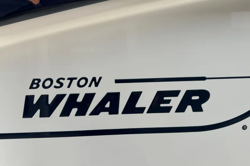 Slide: The Image of Boston Whaler 270 Outrage 2004 logo on boat hull. - 9