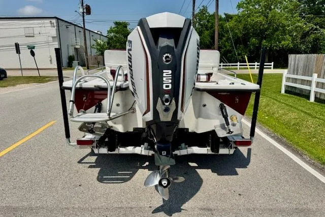 Slide: The Image of Rear view of 2003 Blazer Bay 2220 Fisherman boat with Evinrude outboard motor. - 3