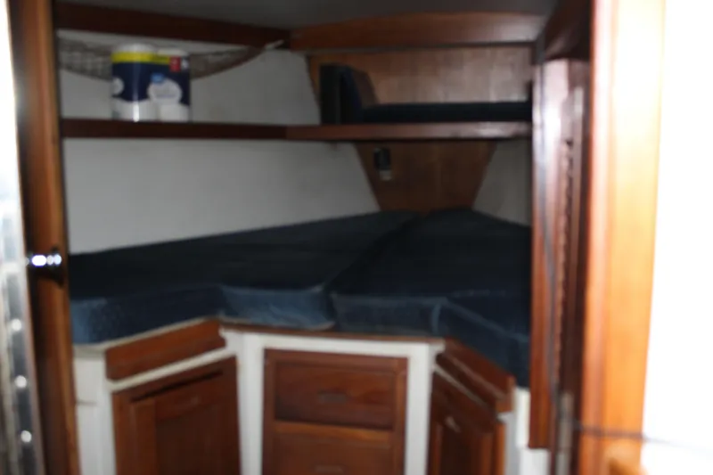 Slide: The Image of Interior cabin of a 1991 Catalina 36 MkII sailboat with wooden cabinetry. - 12