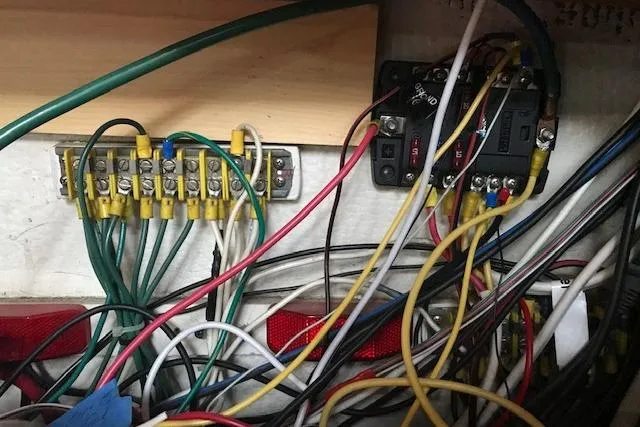Slide: The Image of Electrical wiring and circuit board inside a 1991 Catalina 36 MkII sailboat. - 18