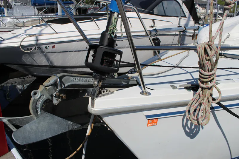 Slide: The Image of Catalina 36 MkII 1991 sailboat with anchor and coiled rope at marina. - 3