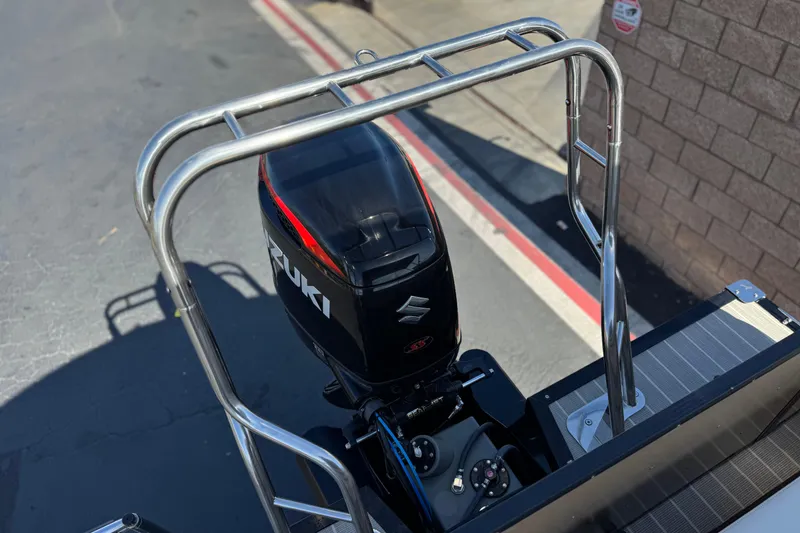 Slide: The Image of 2023 Lexington 623 ST Xtreme boat with Suzuki outboard motor, viewed from above. - 22