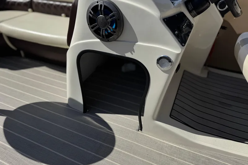 Slide: The Image of 2023 Lexington 623 ST Xtreme boat interior with speaker and seating area. - 27