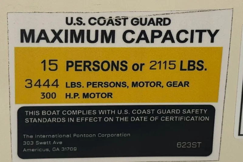 Slide: The Image of 2023 Lexington 623 ST Xtreme boat capacity label: 15 persons or 2115 lbs, 300 HP motor. - 31