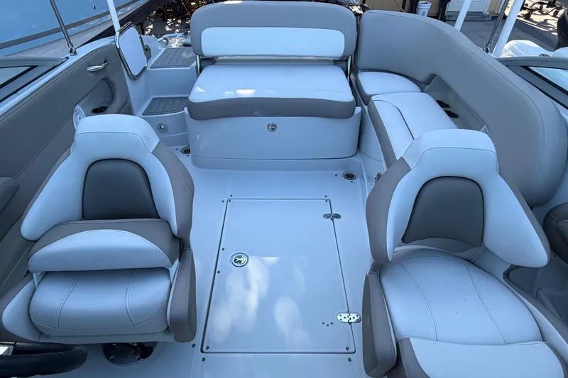 Slide: The Image of 2019 Crownline Eclipse E215 XS boat interior with plush seating and modern design. - 8