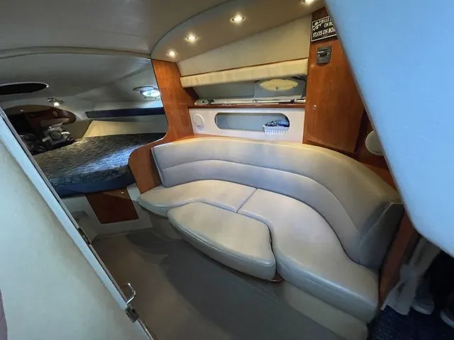 Slide: The Image of Interior of 2006 Cruisers Yachts 280CXI Express Cruiser with seating area. - 14