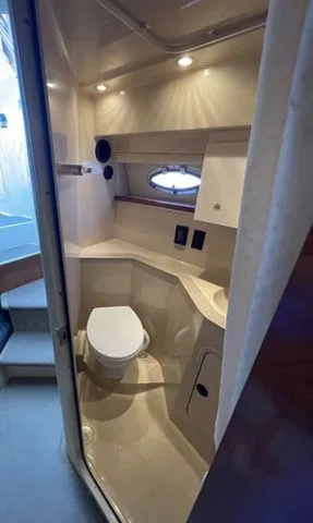 Slide: The Image of Bathroom of 2006 Cruisers Yachts 280CXI Express Cruiser with toilet and sink. - 22