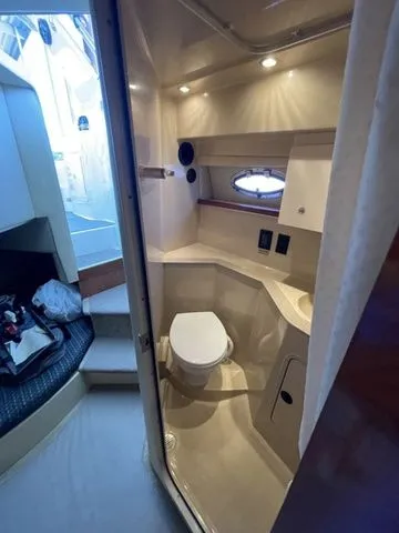 Slide: The Image of Interior of 2006 Cruisers Yachts 280CXI Express Cruiser with bathroom. - 24
