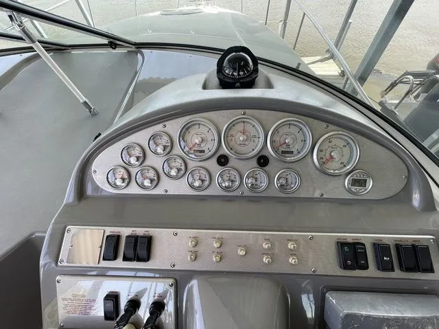 Slide: The Image of Dashboard of a 2006 Cruisers Yachts 280CXI Express Cruiser. - 25
