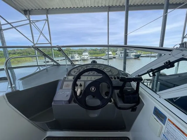 Slide: The Image of Cockpit of 2006 Cruisers Yachts 280CXI Express Cruiser in marina. - 26