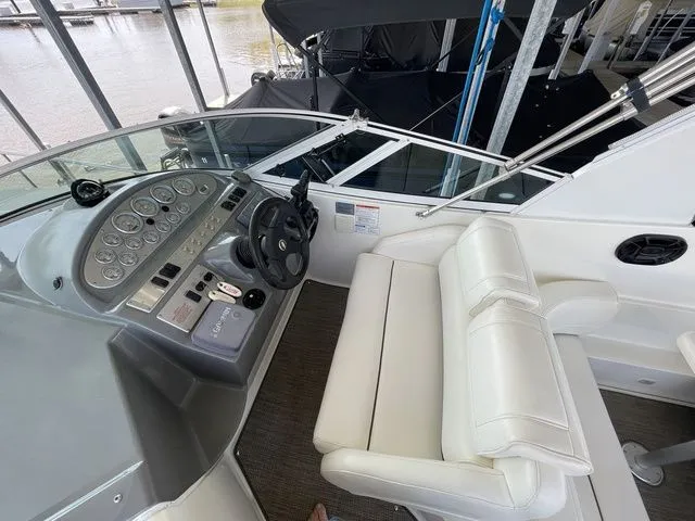 Slide: The Image of Interior view of a 2006 Cruisers Yachts 280CXI Express Cruiser cockpit. - 27