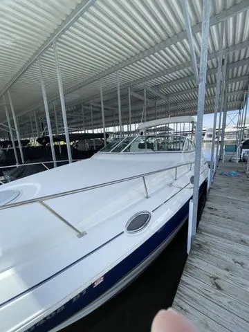 Slide: The Image of 2006 Cruisers Yachts 280CXI Express Cruiser docked in marina. - 34