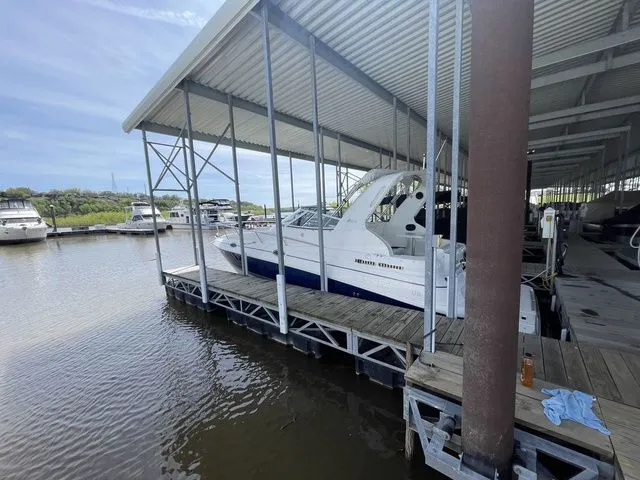 Slide: The Image of 2006 Cruisers Yachts 280CXI Express Cruiser docked at marina. - 35