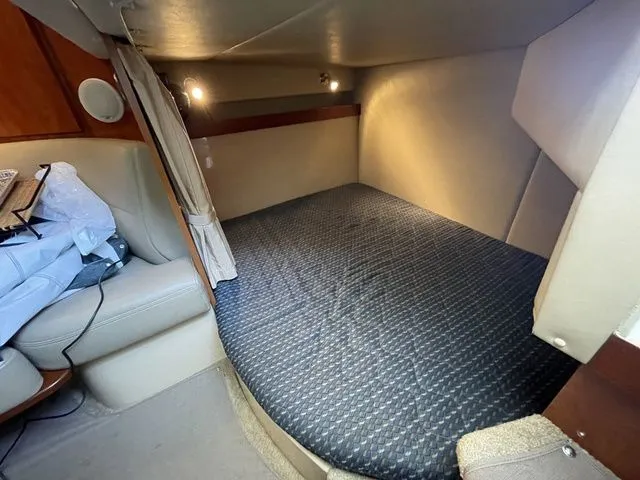 Slide: The Image of Interior of 2006 Cruisers Yachts 280CXI Express Cruiser with sleeping area. - 4