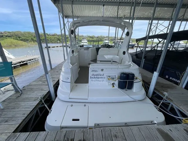 Slide: The Image of 2006 Cruisers Yachts 280CXI Express Cruiser docked at marina. - 43