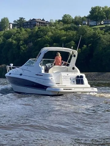 Slide: The Image of 2006 Cruisers Yachts 280CXI Express Cruiser on a river. - 46