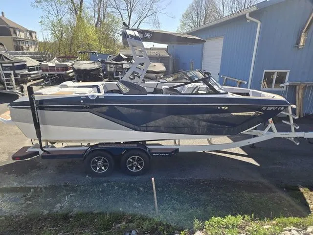 Slide: The Image of 2021 Nautique Super Air Nautique G23 on trailer, side view. - 5