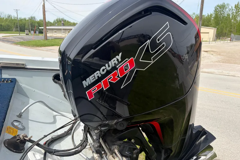 Slide: The Image of Mercury Pro XS outboard motor on a 1991 Lund 1750 Tyee boat. - 3