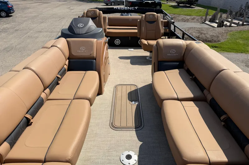 Slide: The Image of Luxurious 2020 Regency 250 LE3 Sport pontoon boat with tan leather seating. - 10