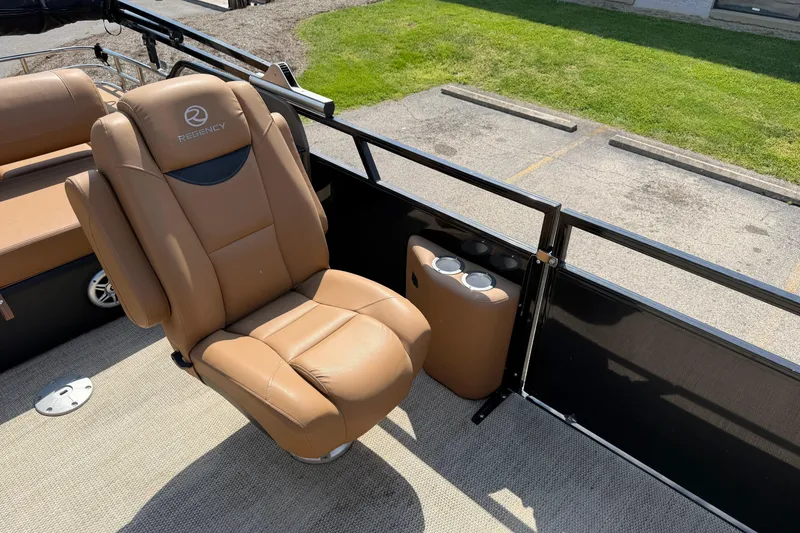 Slide: The Image of Luxurious seating on 2020 Regency 250 LE3 Sport boat with cup holders. - 12