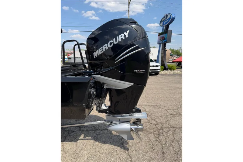 Slide: The Image of Mercury Verado outboard motor on 2020 Regency 250 LE3 Sport boat, parked outdoors. - 17
