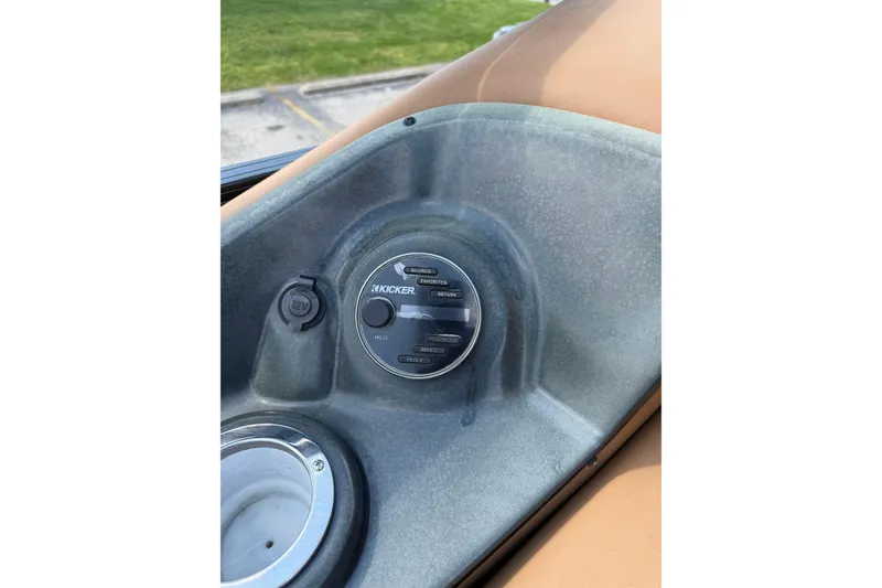 Slide: The Image of Control panel of 2020 Regency 250 LE3 Sport boat with Kicker audio system. - 8