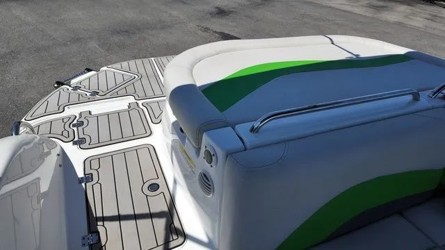 Slide: The Image of 2019 Hurricane SS 202 I/O boat with green accent and gray deck. - 11