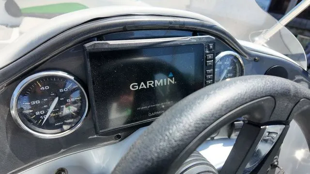 Slide: The Image of Dashboard of 2019 Hurricane SS 202 I/O with Garmin navigation system. - 16