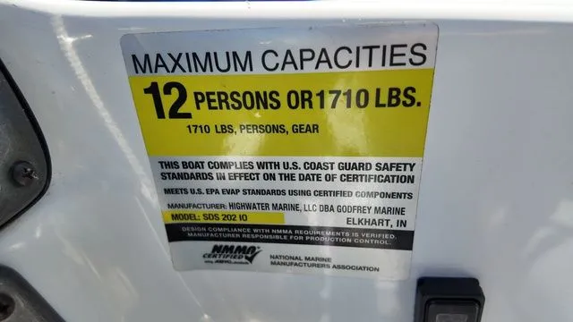 Slide: The Image of Safety label for Hurricane SS 202 I/O boat, maximum capacity 12 persons or 1710 lbs. - 17