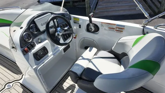 Slide: The Image of Interior of a 2019 Hurricane SS 202 I/O boat with steering console. - 18
