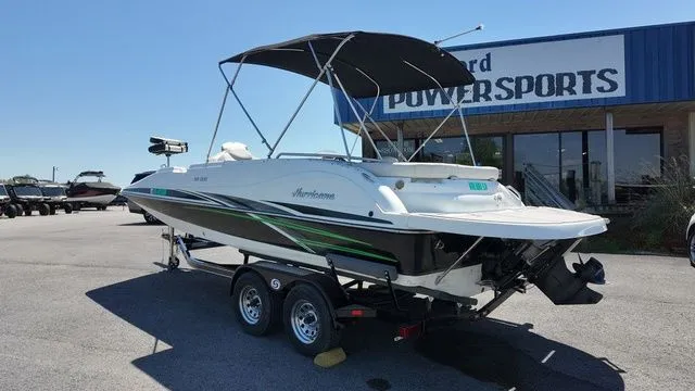 Slide: The Image of 2019 Hurricane SS 202 I/O boat on trailer outside Powersports store. - 3