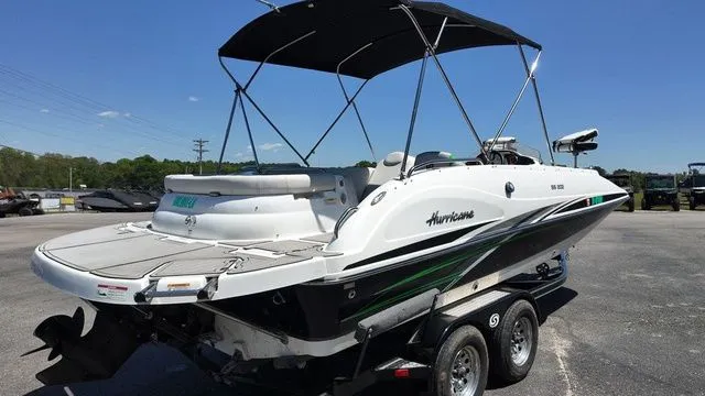 Slide: The Image of 2019 Hurricane SS 202 I/O boat with trailer, black canopy. - 5