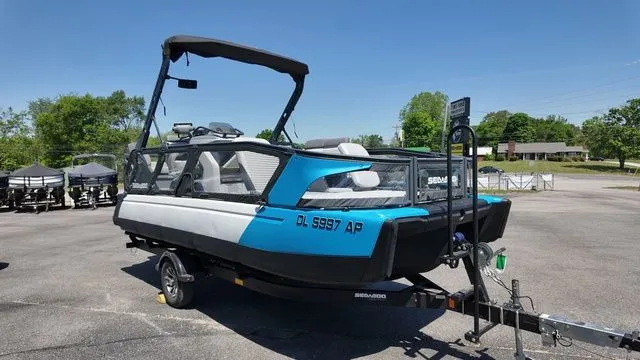 Slide: The Image of 2023 Sea-Doo Switch Sport 21 parked outdoors on a trailer. - 10