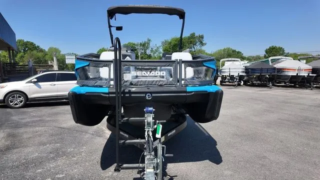Slide: The Image of 2023 Sea-Doo Switch Sport 21 on a trailer, front view. - 11
