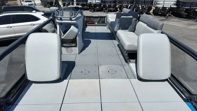Slide: The Image of 2023 Sea-Doo Switch Sport 21 pontoon boat with spacious deck. - 12