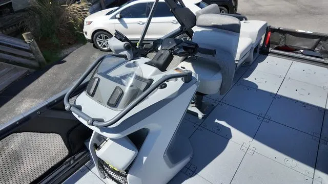 Slide: The Image of 2023 Sea-Doo Switch Sport 21 cockpit with steering console and seats. - 14