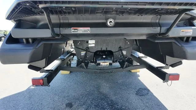 Slide: The Image of Rear view of a 2023 Sea-Doo Switch Sport 21 on a trailer. - 5