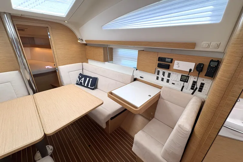 Slide: The Image of Modern interior of 2018 Elan Impression yacht with cozy seating and navigation controls. - 17