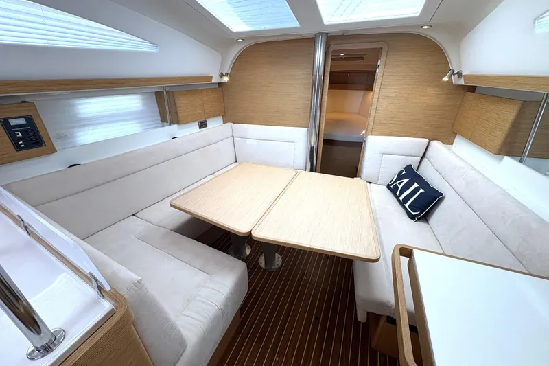 Slide: The Image of Luxurious interior of a 2018 Elan Impression yacht with elegant seating and wooden accents. - 19