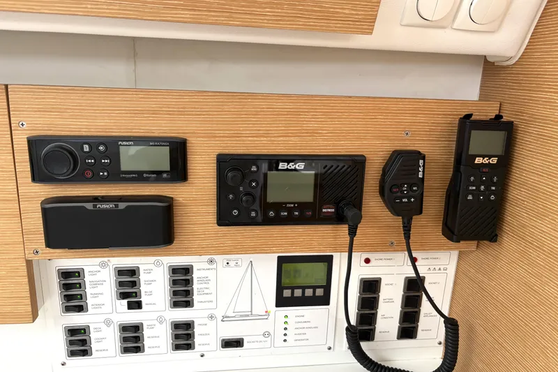 Slide: The Image of Control panel of a 2018 Elan Impression yacht with navigation and communication equipment. - 24