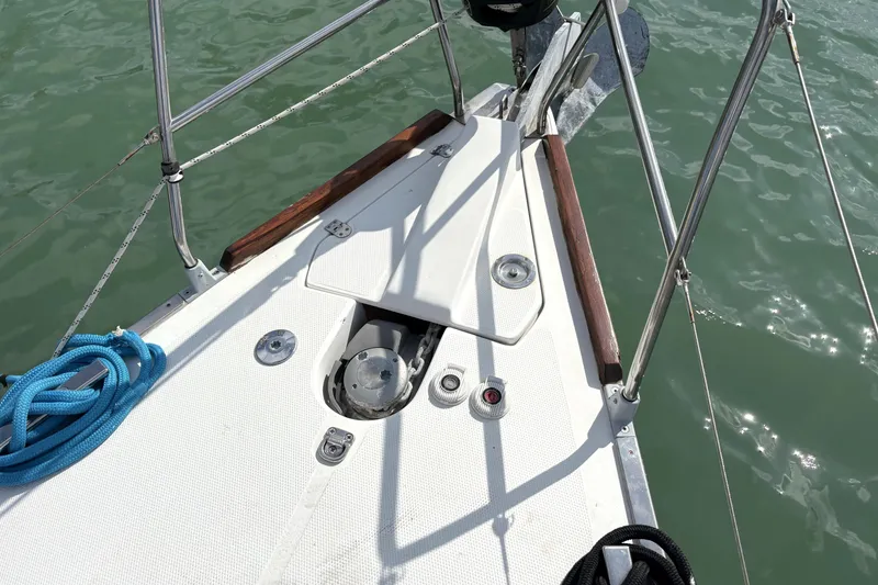 Slide: The Image of Bow of a 2018 Elan Impression yacht with anchor and blue rope. - 3