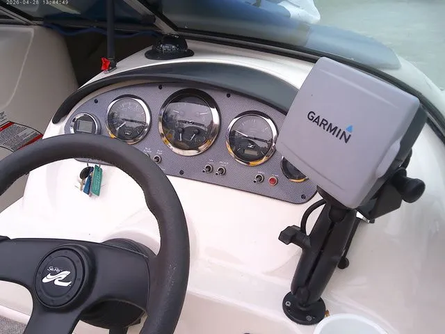 Slide: The Image of Dashboard of a 2007 Sea Ray 205 boat with Garmin GPS. - 7
