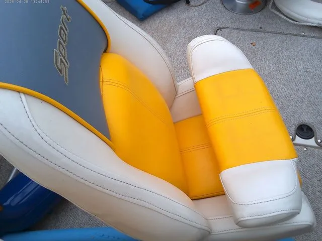 Slide: The Image of Yellow and white seat of a 2007 Sea Ray 205 boat. - 8