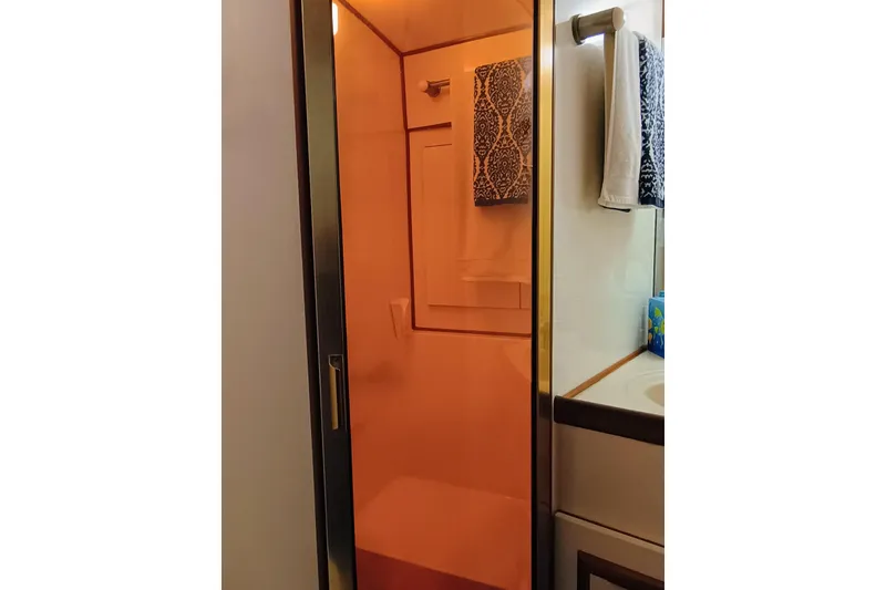 Slide: The Image of Shower area in 1988 Vantare 46' Aft Cabin Wide Body MY yacht forward bathroom. - 24