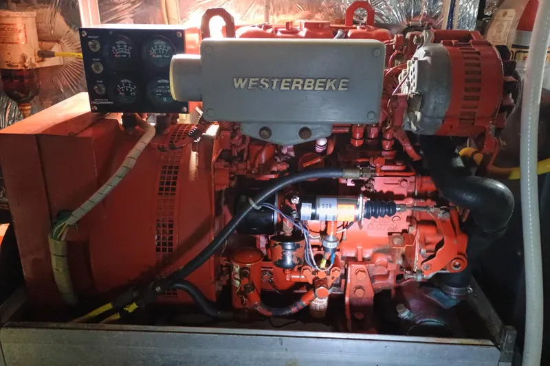 Slide: The Image of Engine room of 1988 Vantare 46' Aft Cabin Wide Body MY with Westerbeke generator. - 58